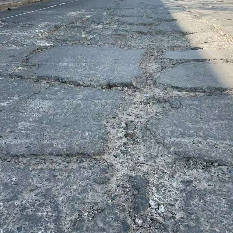 虹口路面起砂露石子修补料